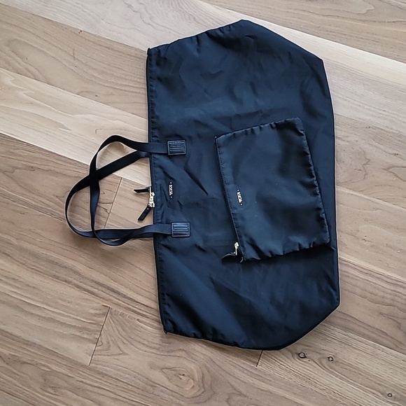 Tumi Handbags - Tumi black nylon travel tote bag w/ matching cosmetic bag gold accents